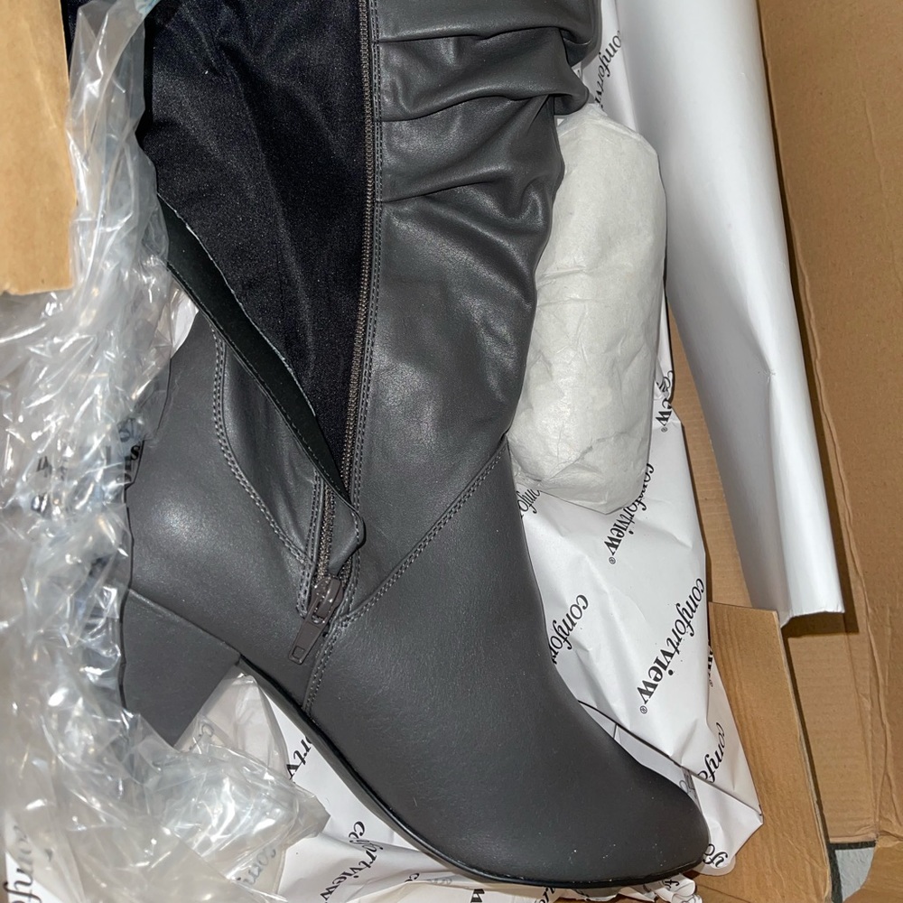 Brand new black boots